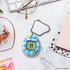 Bandai - The Original Tamagotchi (Gen 2) Flower Gingham Portable Electronic Game (42939) LOW STOCK